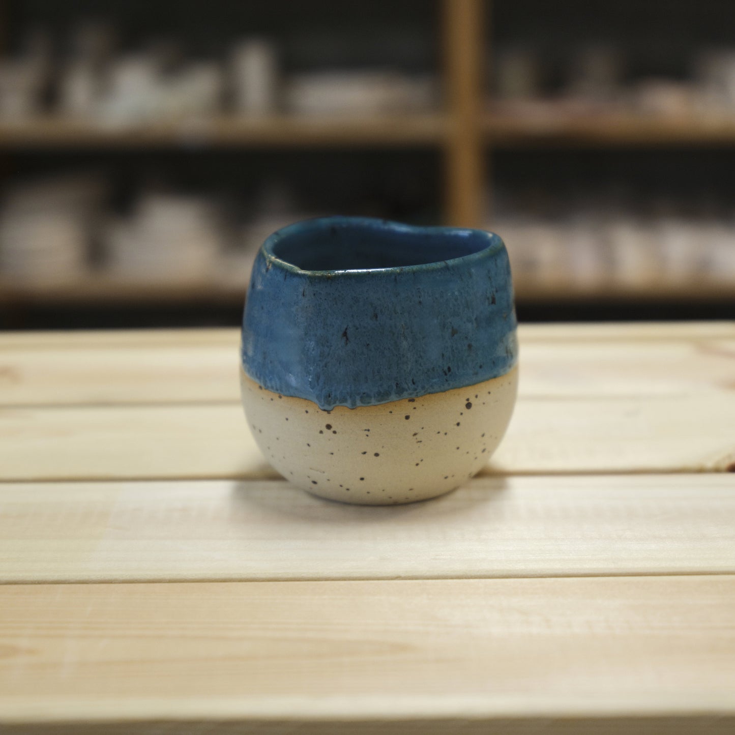 Detail view of handmade ceramic Heart Cup Teal - Speckled Ceramic Cube Qatar